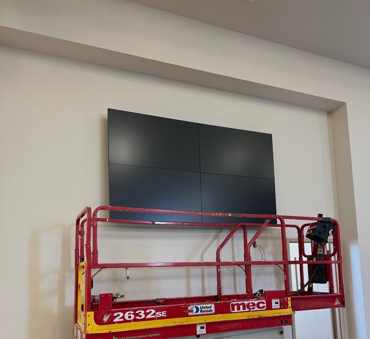 Finished four-panel video wall on the same wall